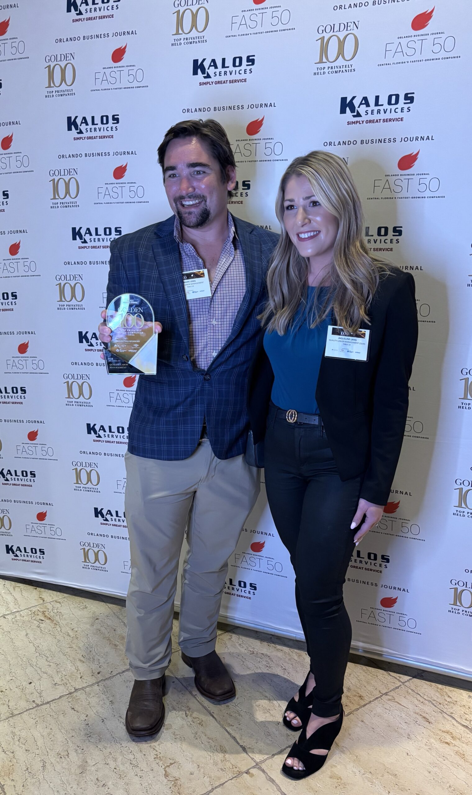 QLM representatives Mark Lang Jr. and Jacqueline Lang Lee at the Golden 100 event